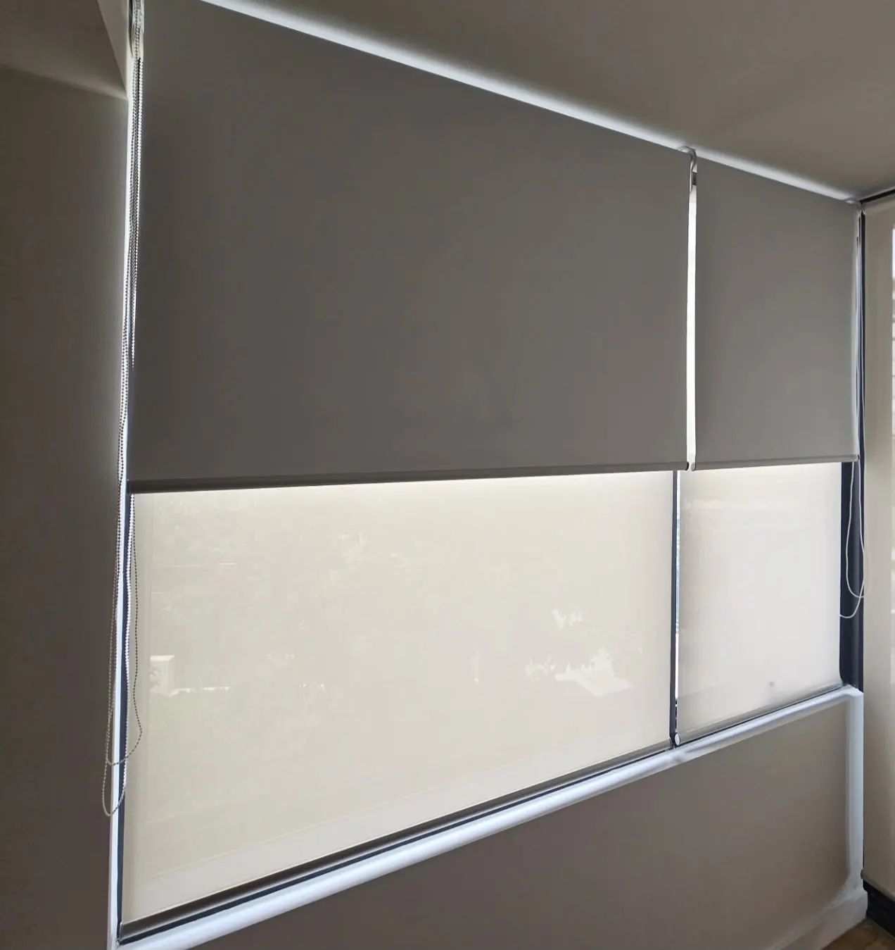 Roller blind fitted at a window – Harborne Blinds